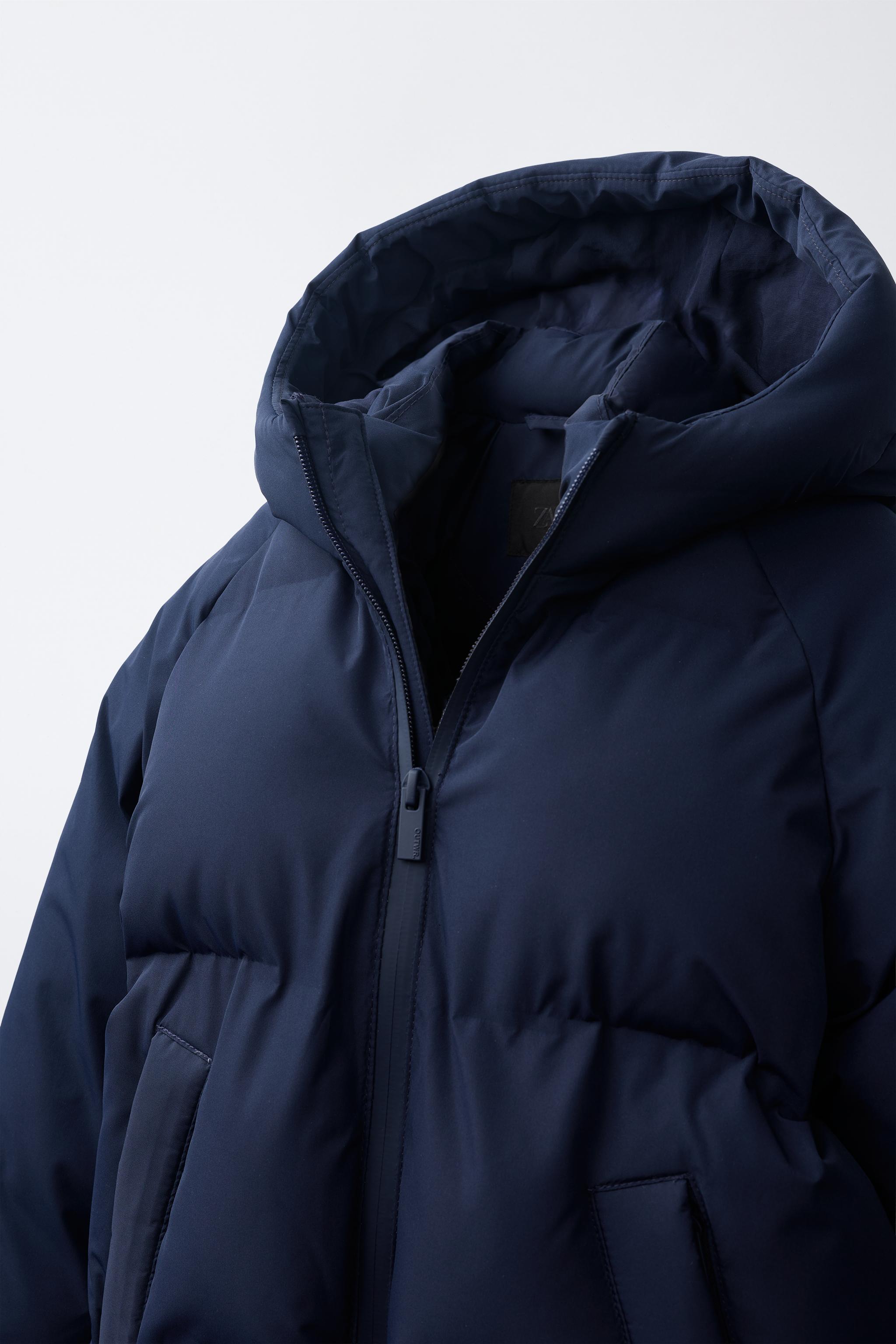 MANTEAU MATELASSÉ À CAPUCHE DÉPERLANT